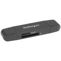 a close up of a wii remote on a table  a close up of a wii remote on a table